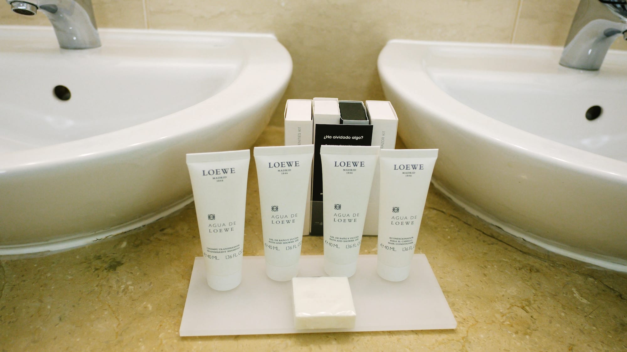 a group of white containers on a white surface