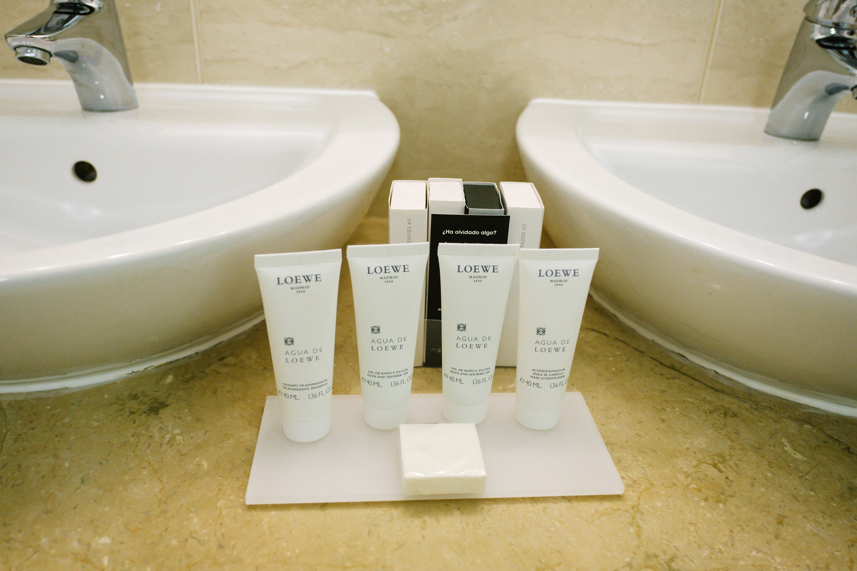 a group of white containers on a white surface