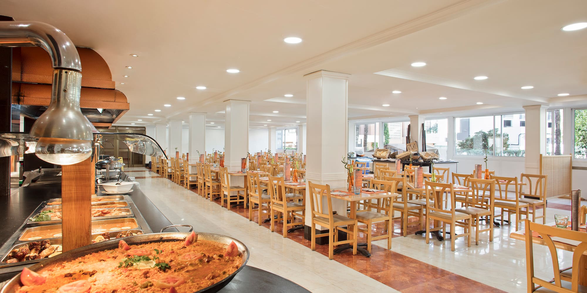 a large room with many tables and chairs