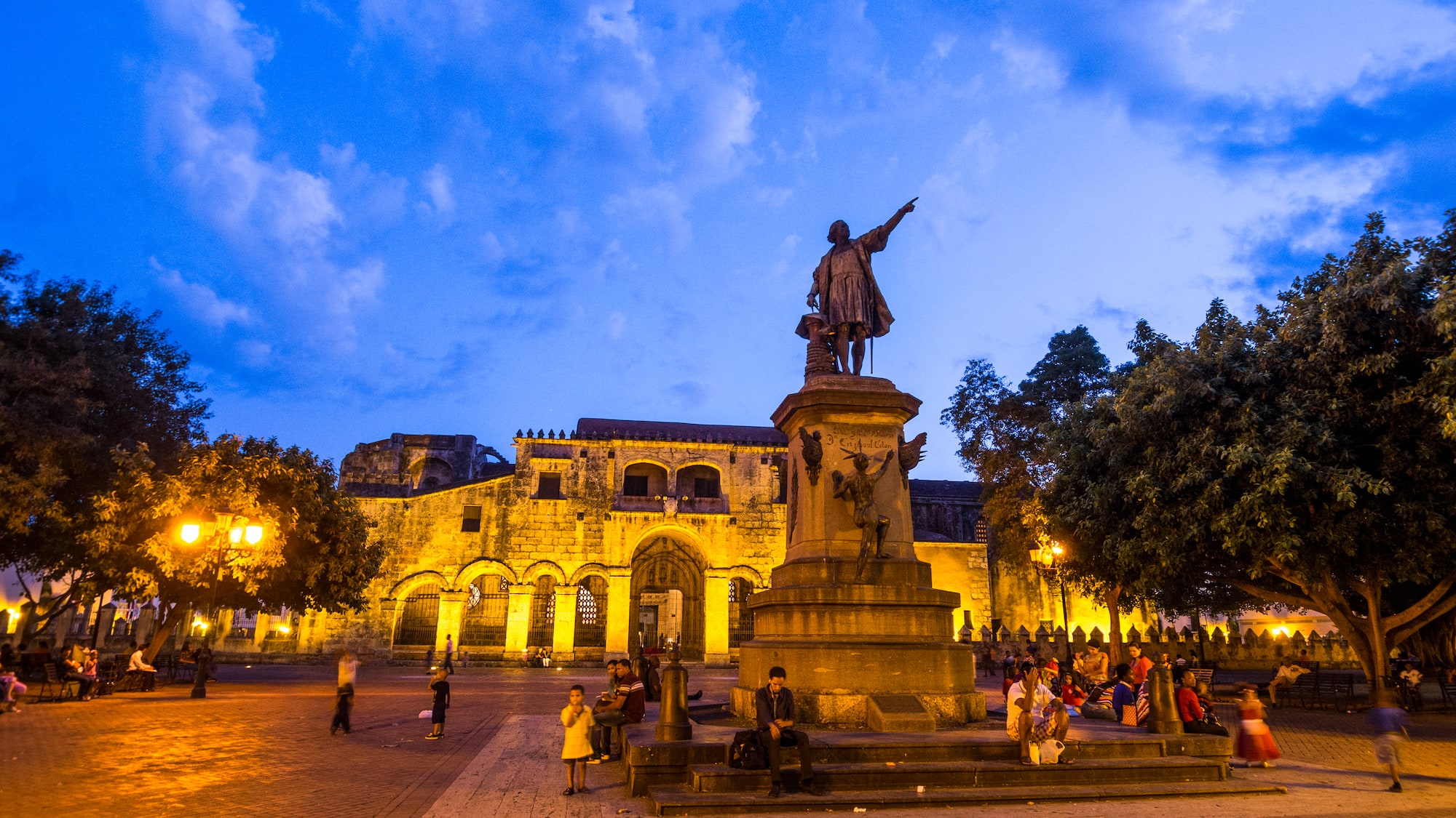 a statue of a man pointing at something