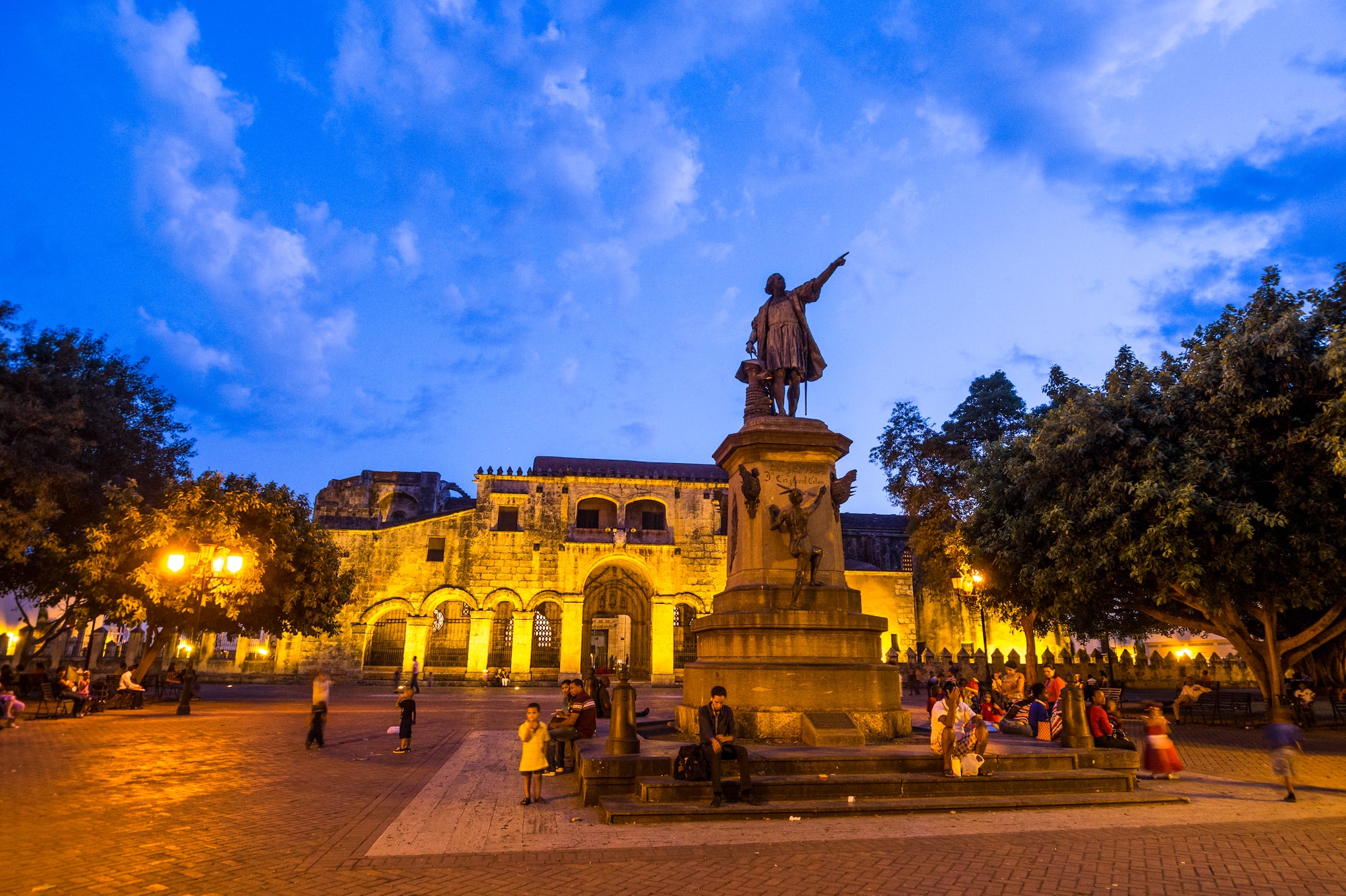 a statue of a man pointing at something