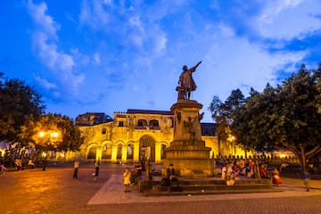 a statue of a man pointing at something
