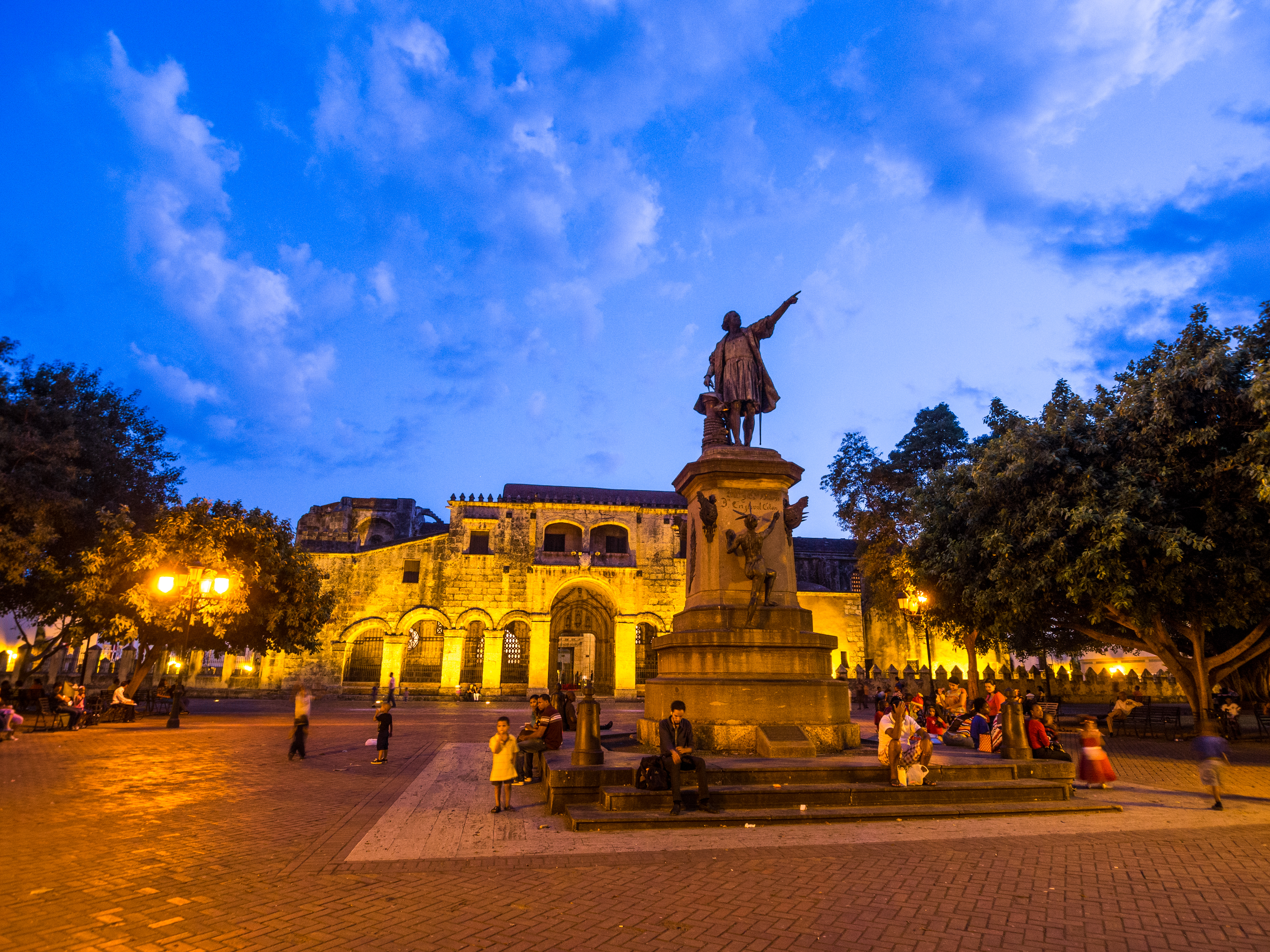 a statue of a man pointing at something