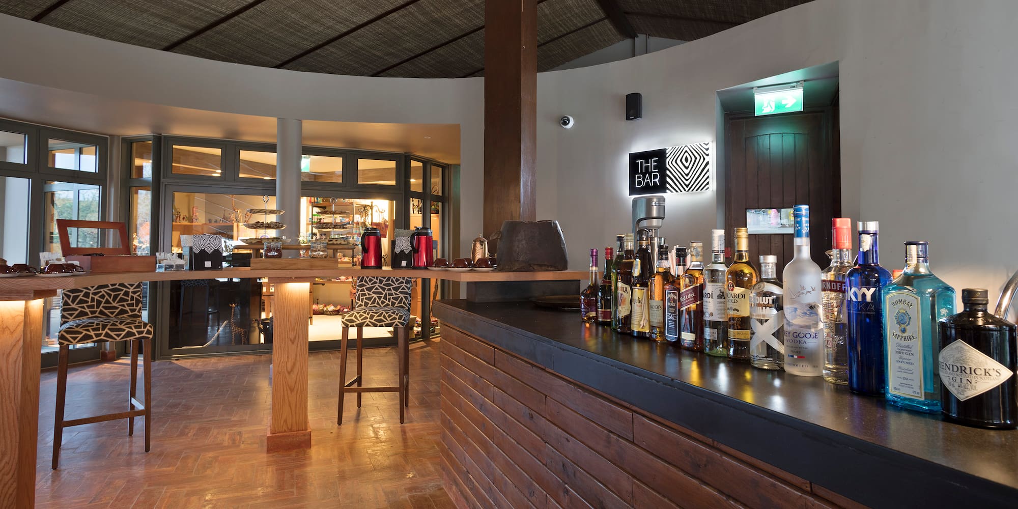 a bar with bottles of alcohol on it