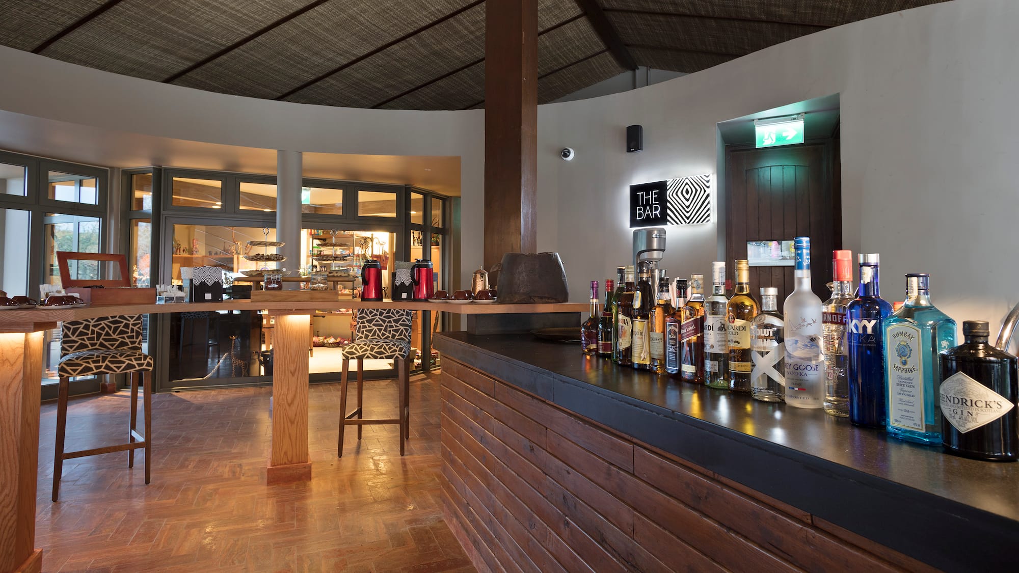 a bar with bottles of alcohol on it