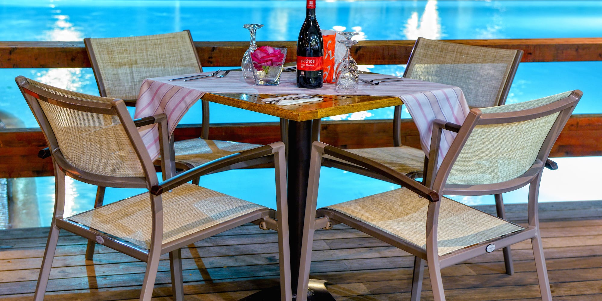 a table with wine and glasses on it