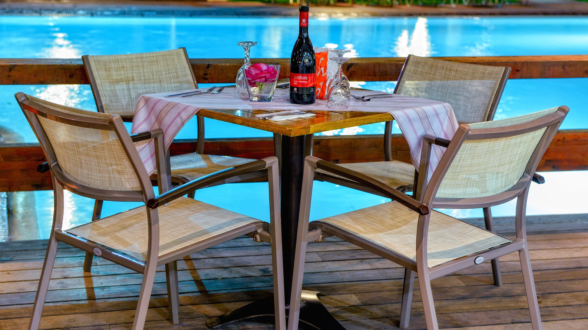 a table with wine and glasses on it