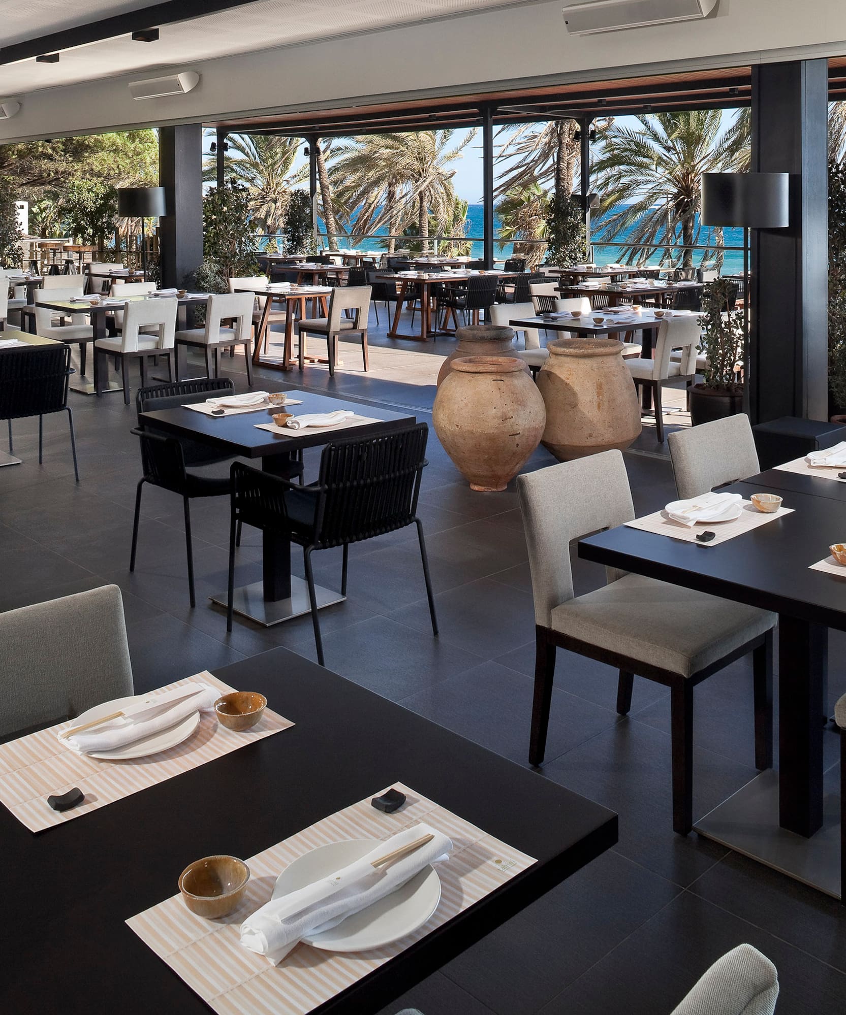 a restaurant with tables and chairs