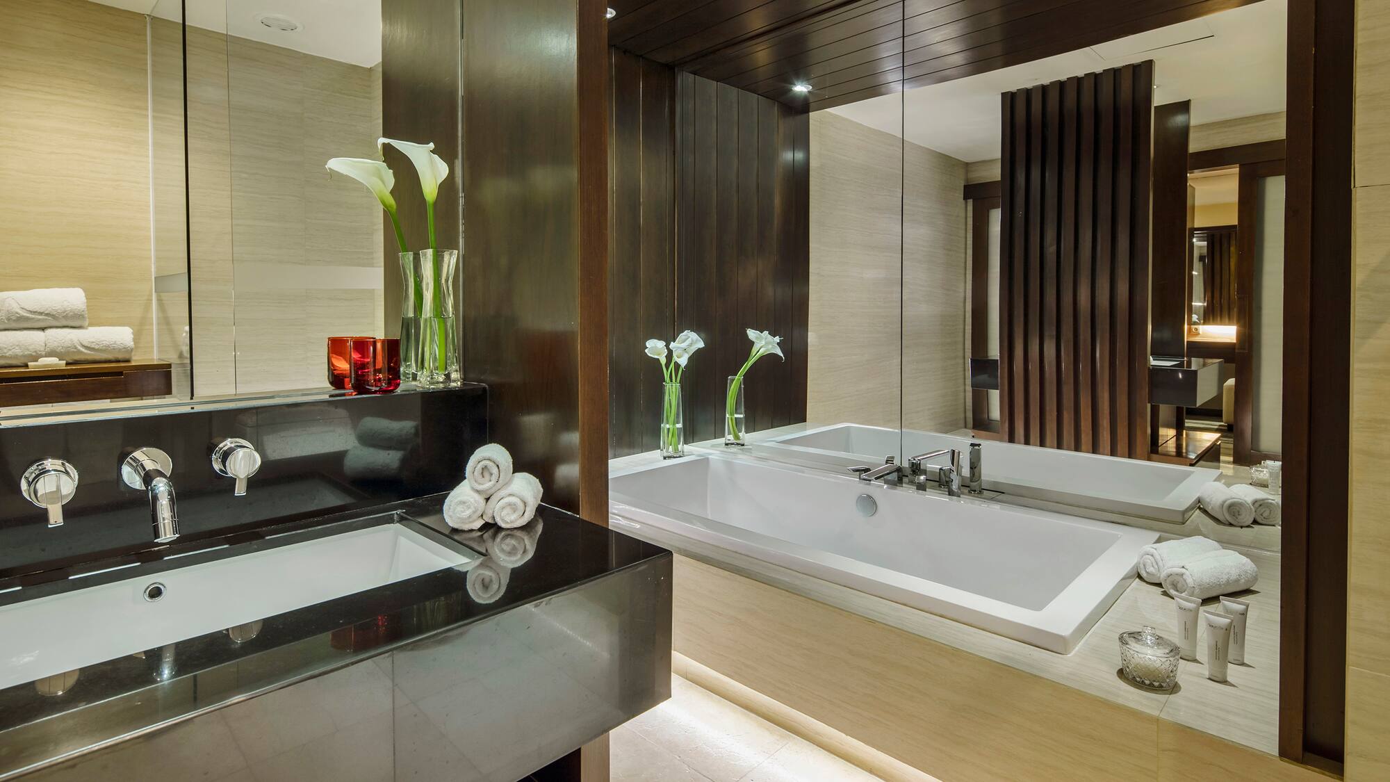 a bathroom with a bathtub and a sink