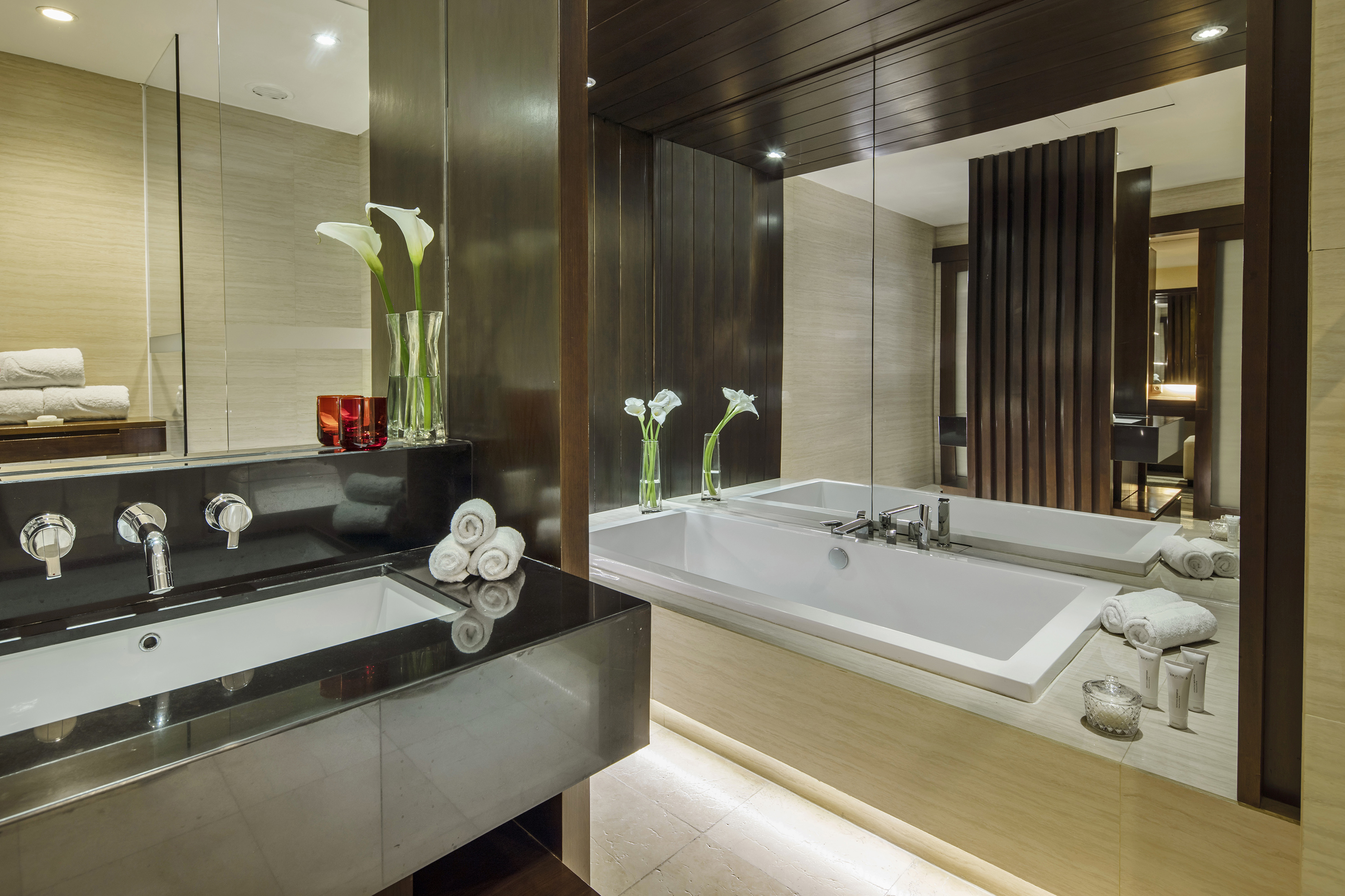 a bathroom with a bathtub and a sink