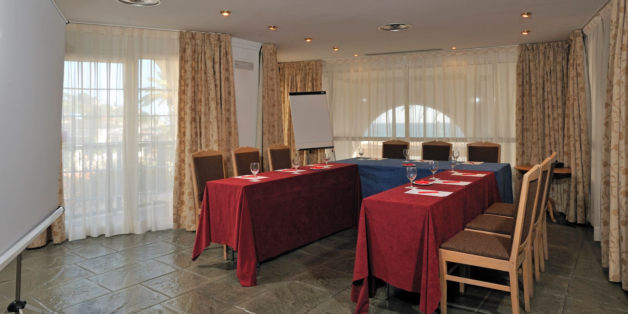 a room with tables and chairs