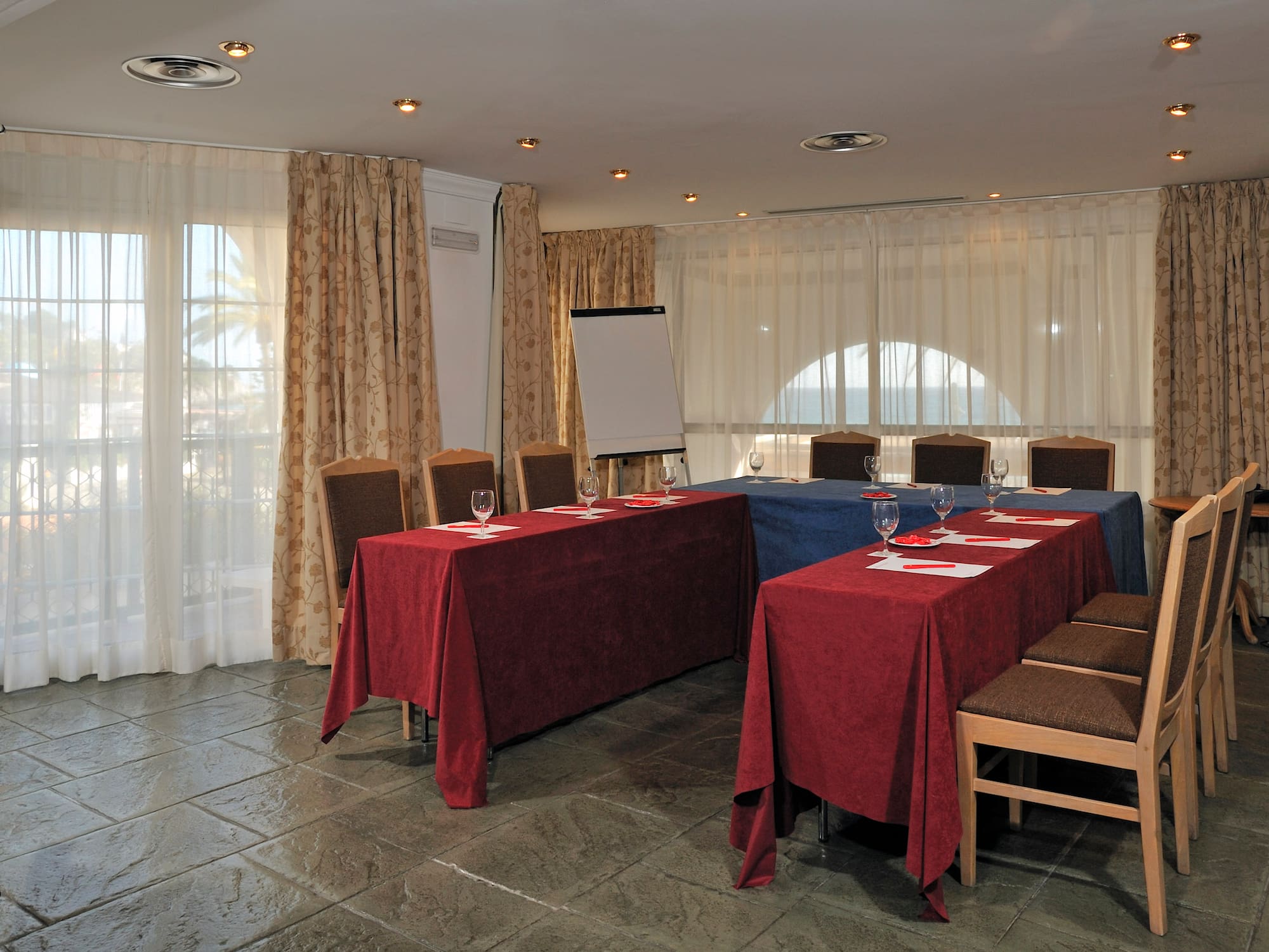 a room with tables and chairs