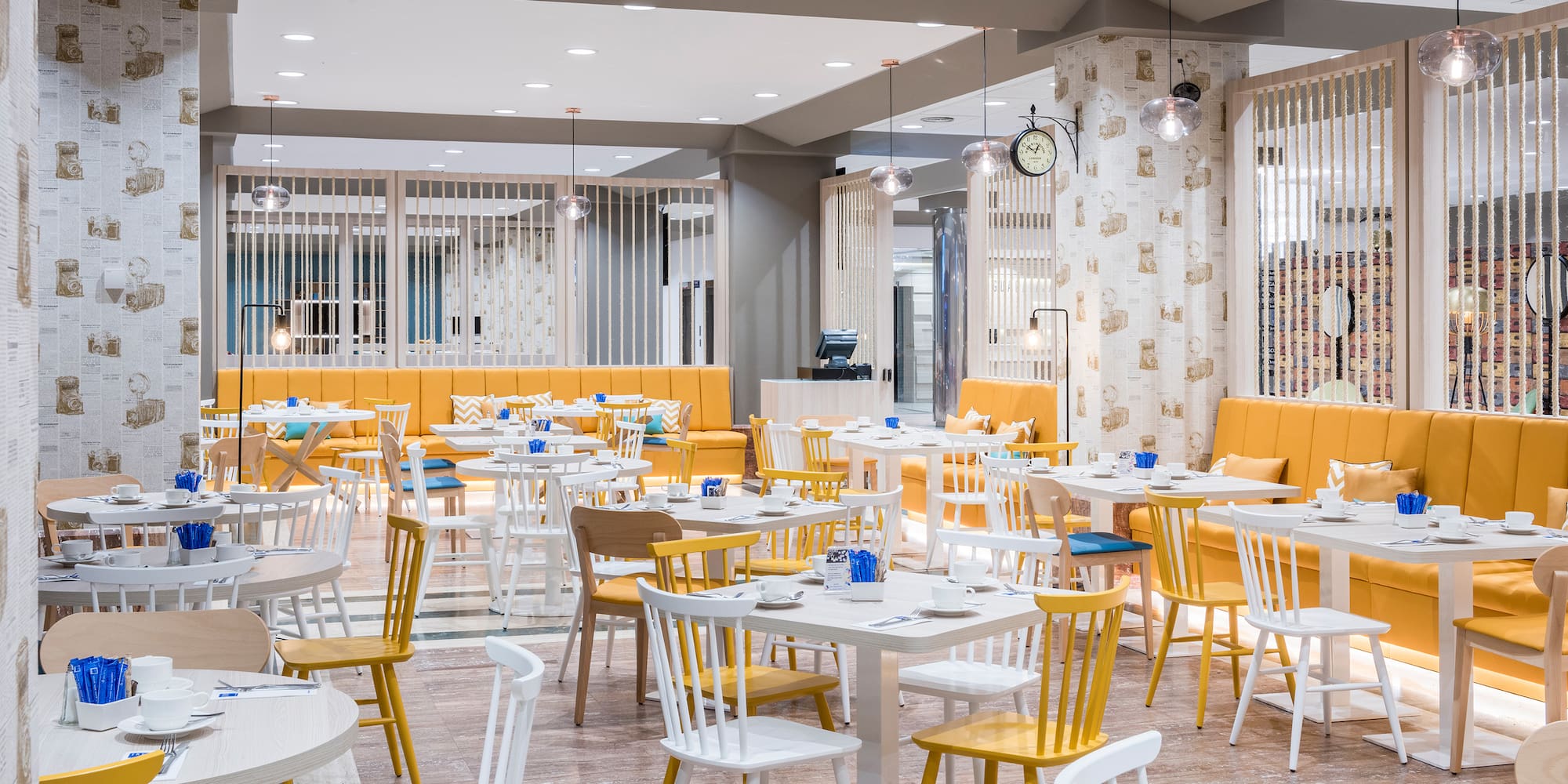 a room with tables and chairs