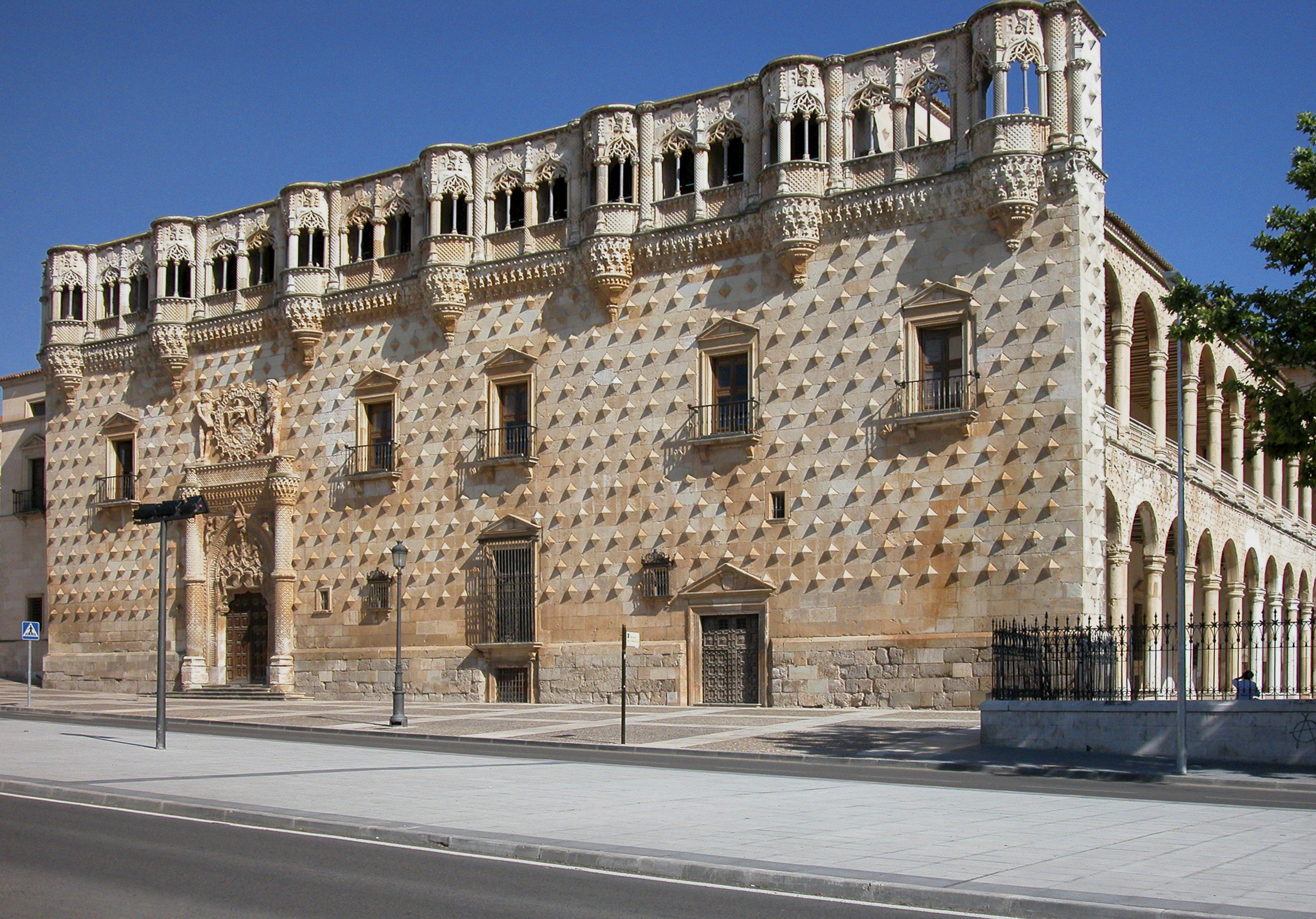 Palacio del Infantado, Guadalajara. Historic diamond facade and ornate windows.
