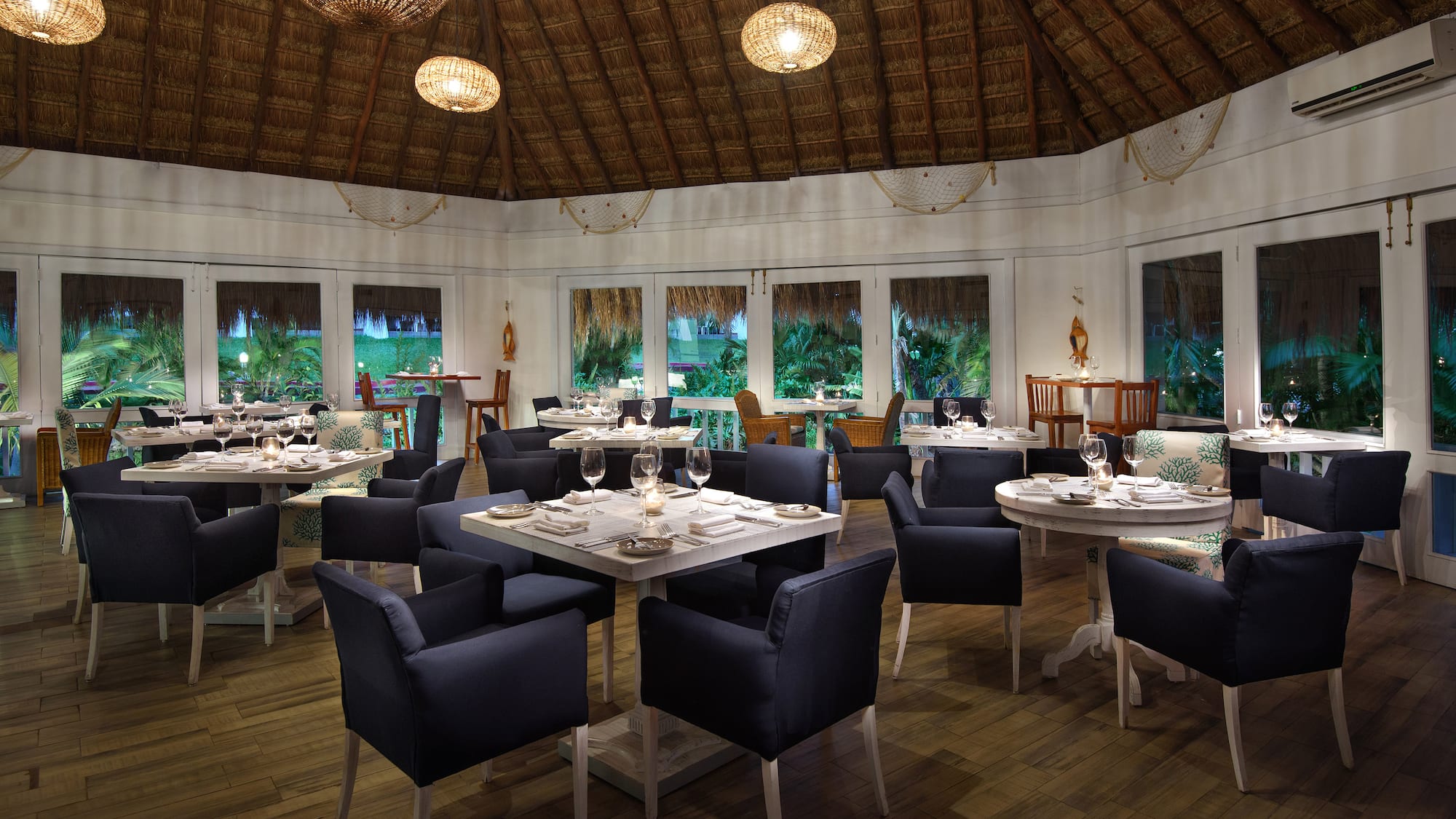 a room with tables and chairs