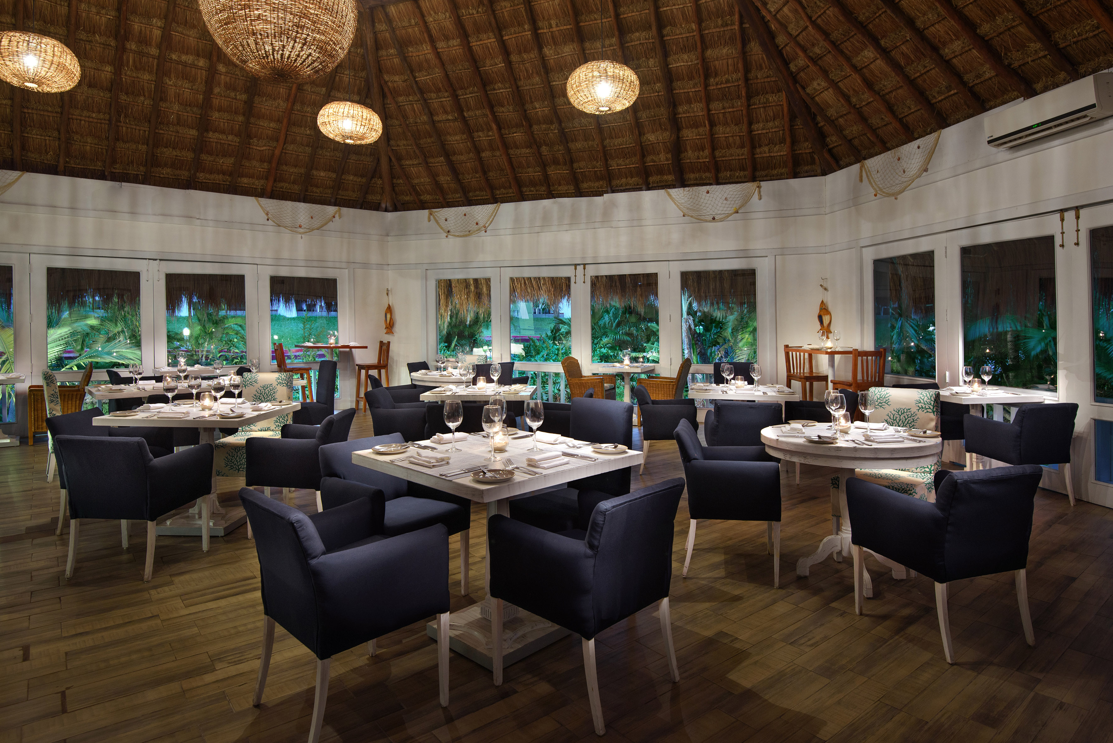 a room with tables and chairs