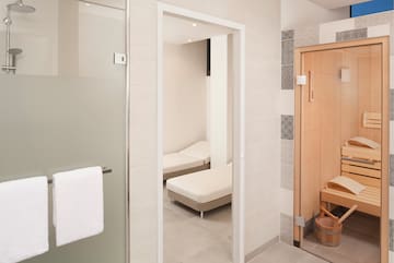a bathroom with a door open