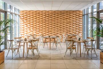 a room with tables and chairs