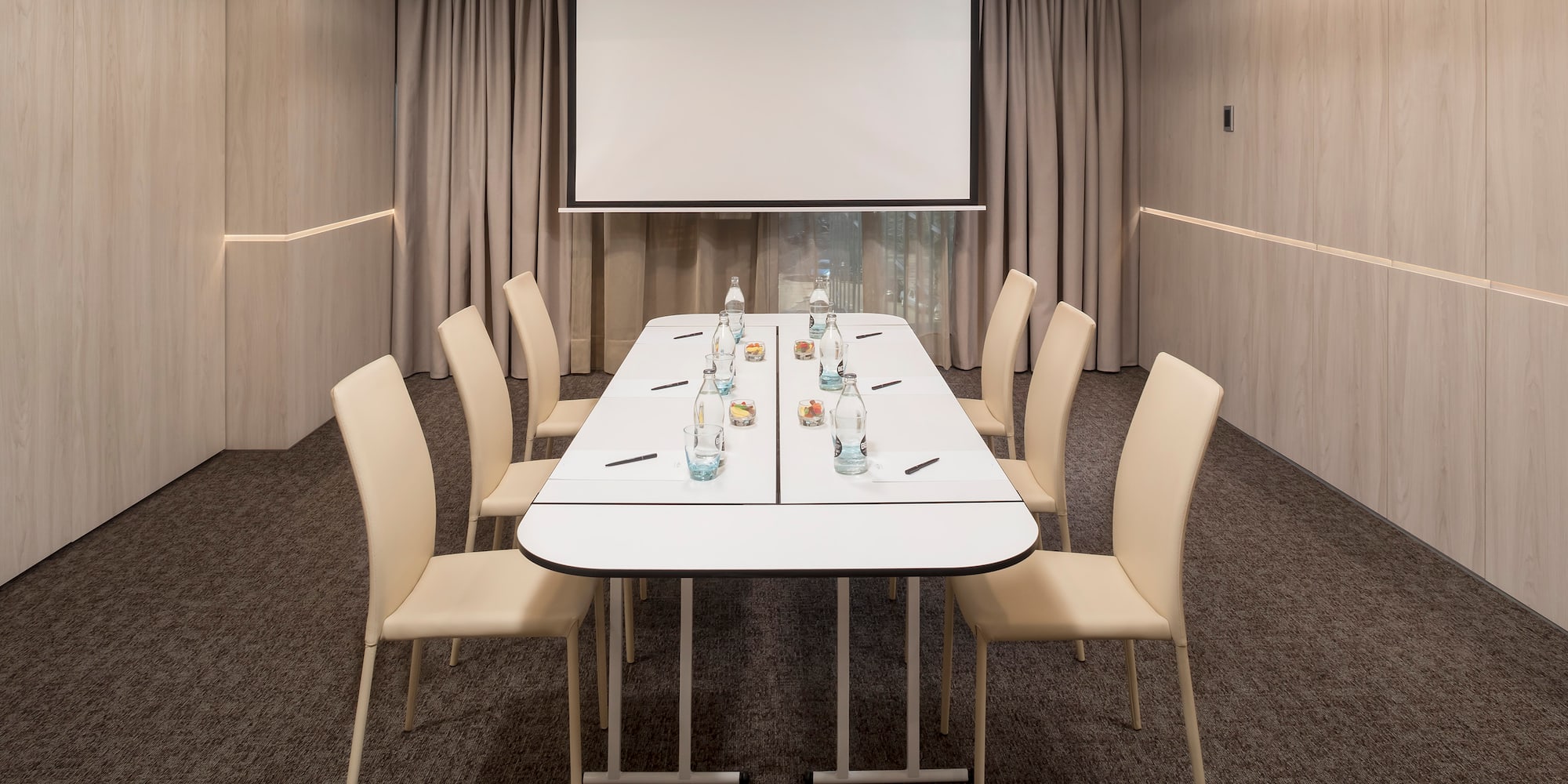 a room with a table and chairs