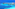 Catamaran sailboat docked at wooden pier in vibrant blue tropical ocean.