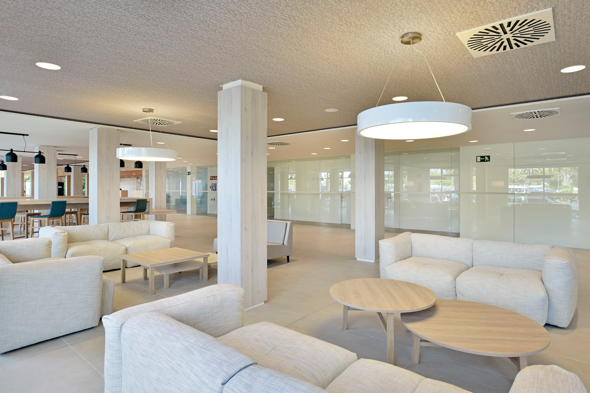 a room with couches and tables
