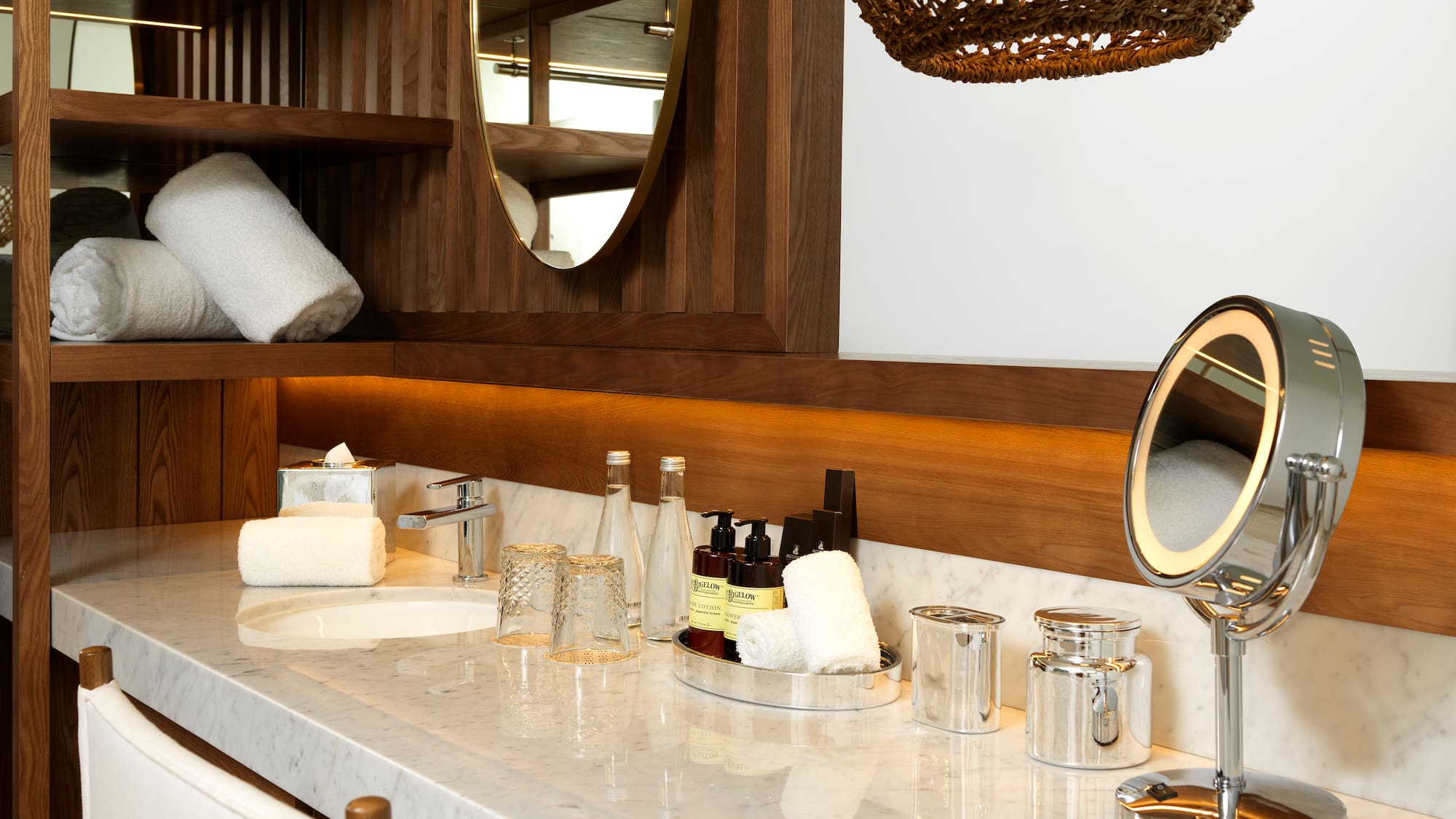 a bathroom with a mirror and a sink