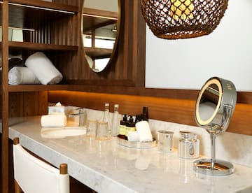 a bathroom with a mirror and a sink