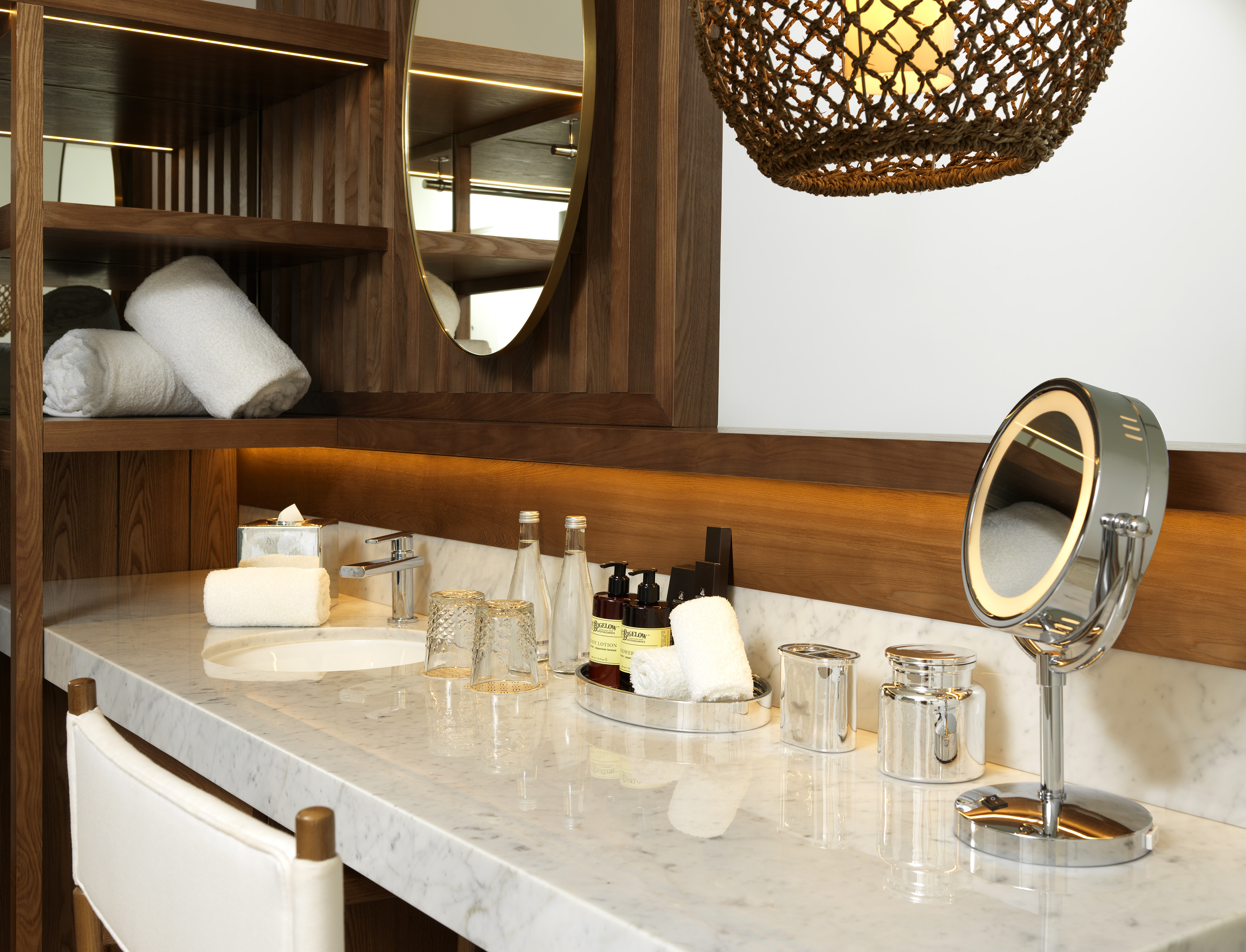 a bathroom with a mirror and a sink