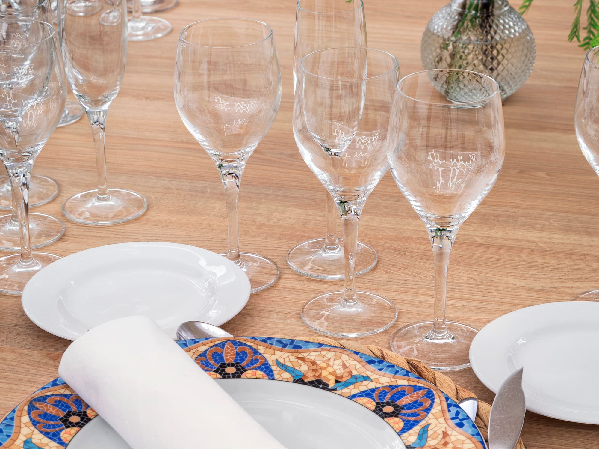 a table with plates and glasses