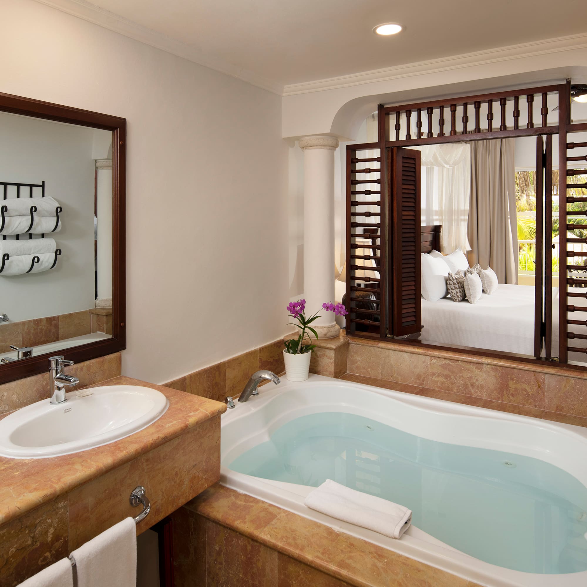 a bathroom with a bathtub and sink