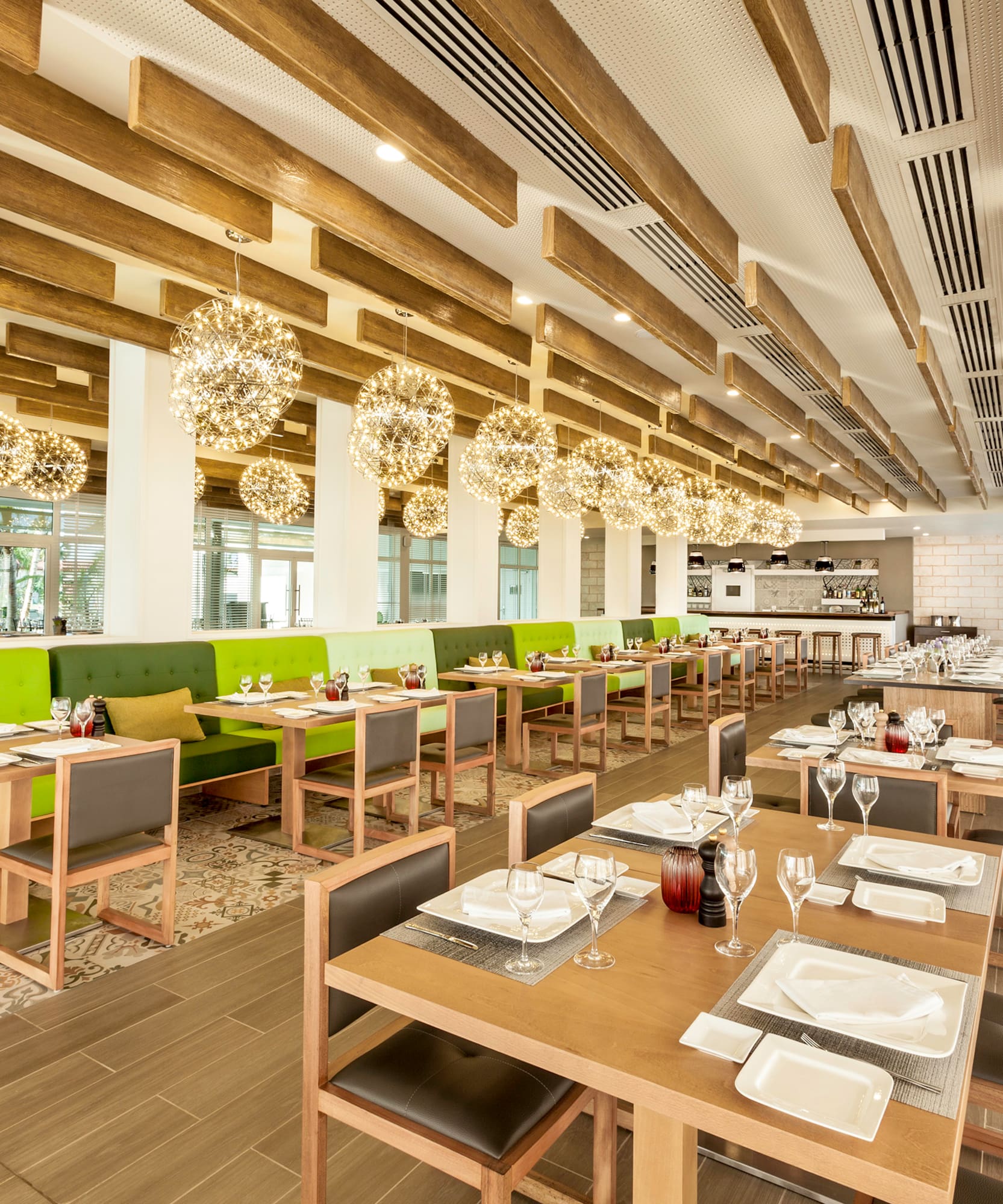 a restaurant with tables and chairs