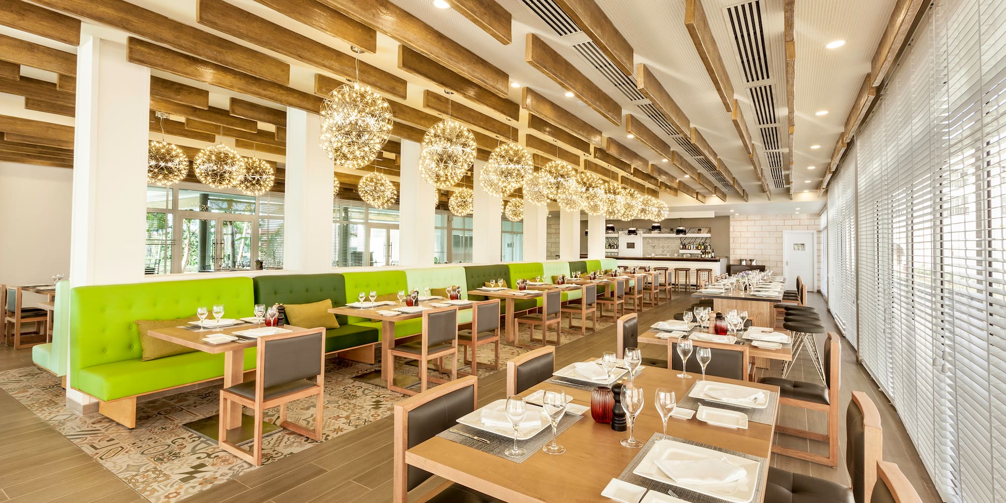 a restaurant with tables and chairs