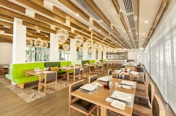 a restaurant with tables and chairs