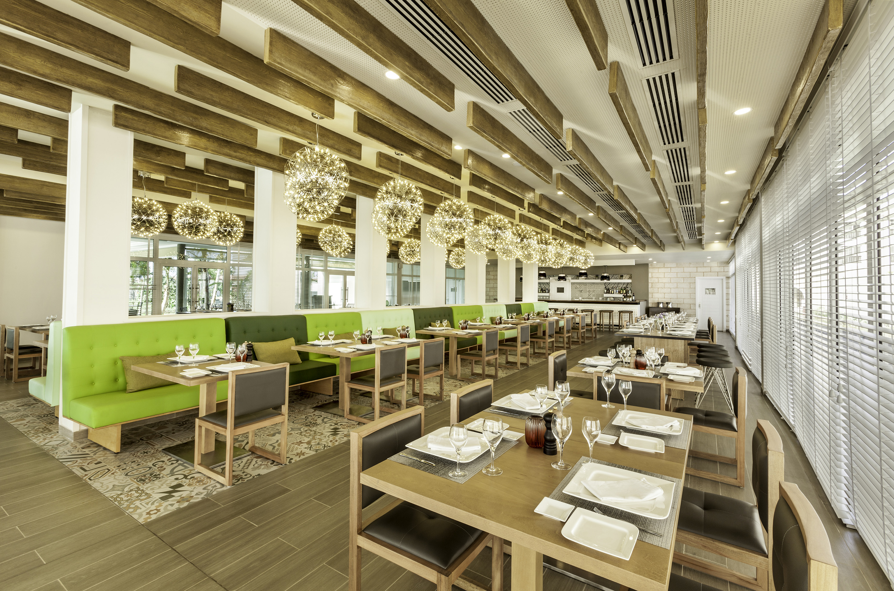 a restaurant with tables and chairs