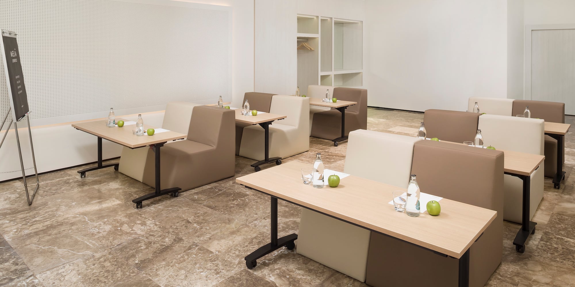 a room with tables and chairs