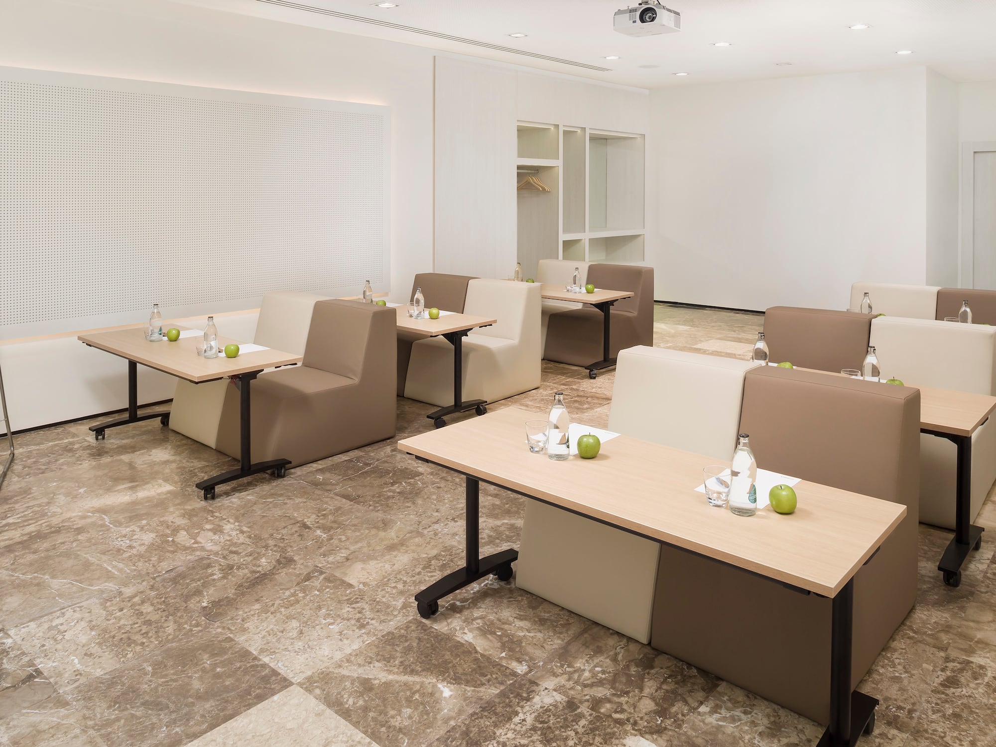 a room with tables and chairs