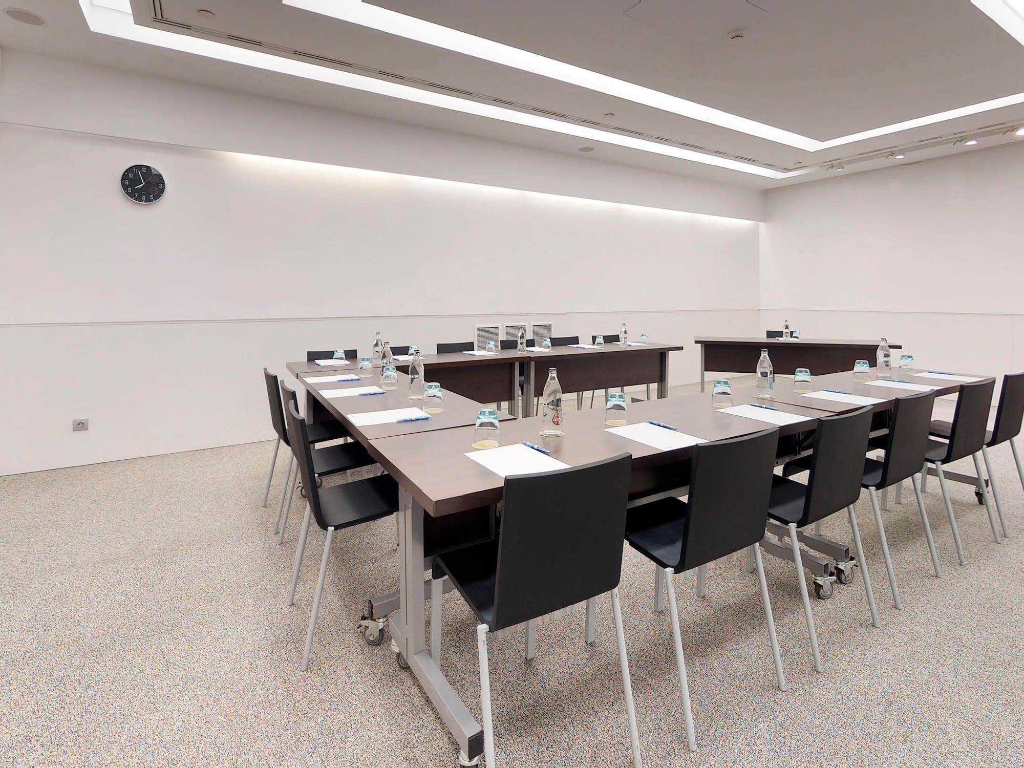 a room with a table and chairs