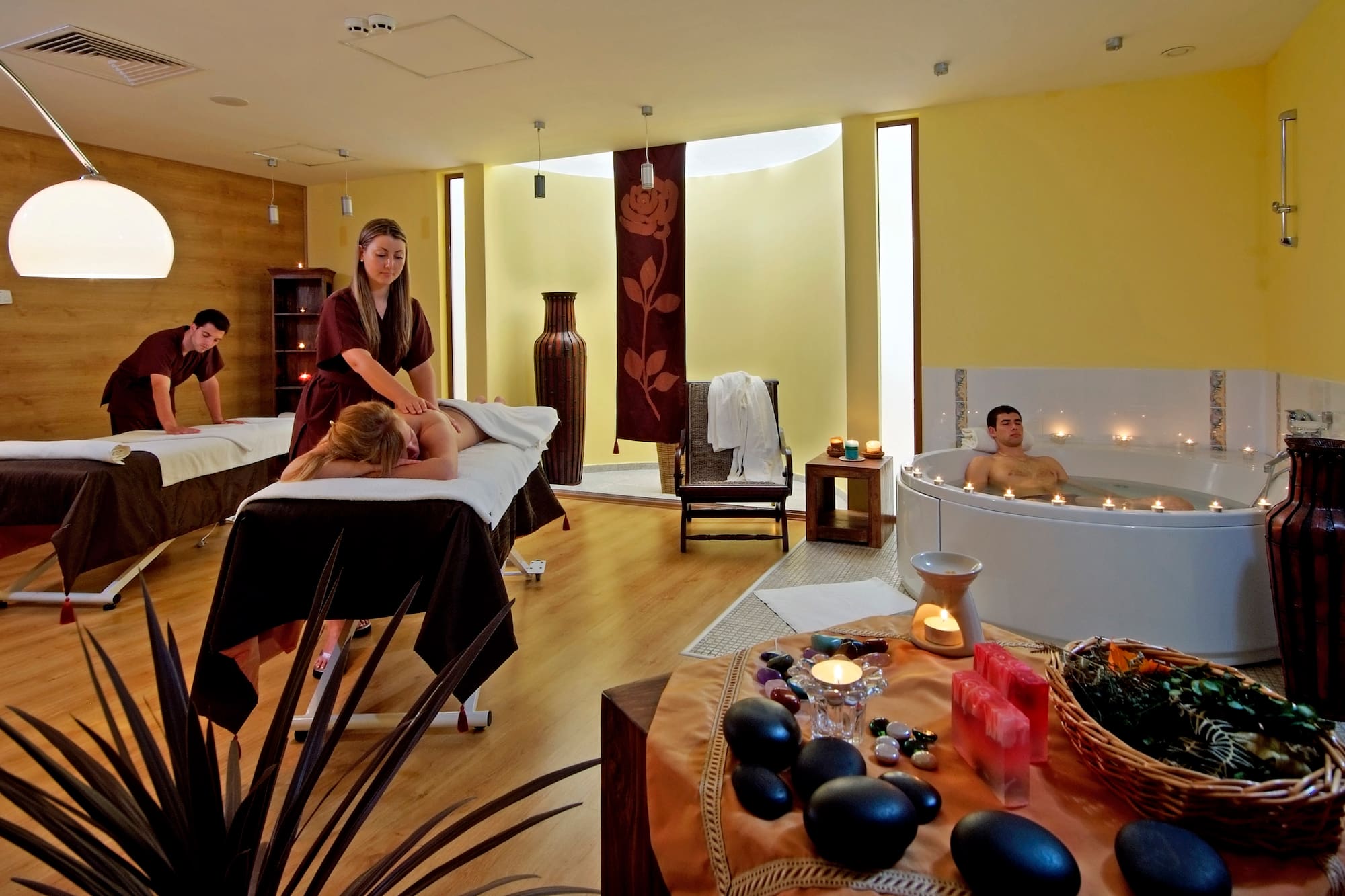 a group of people in a spa room