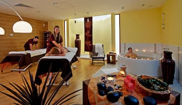 a group of people in a spa room