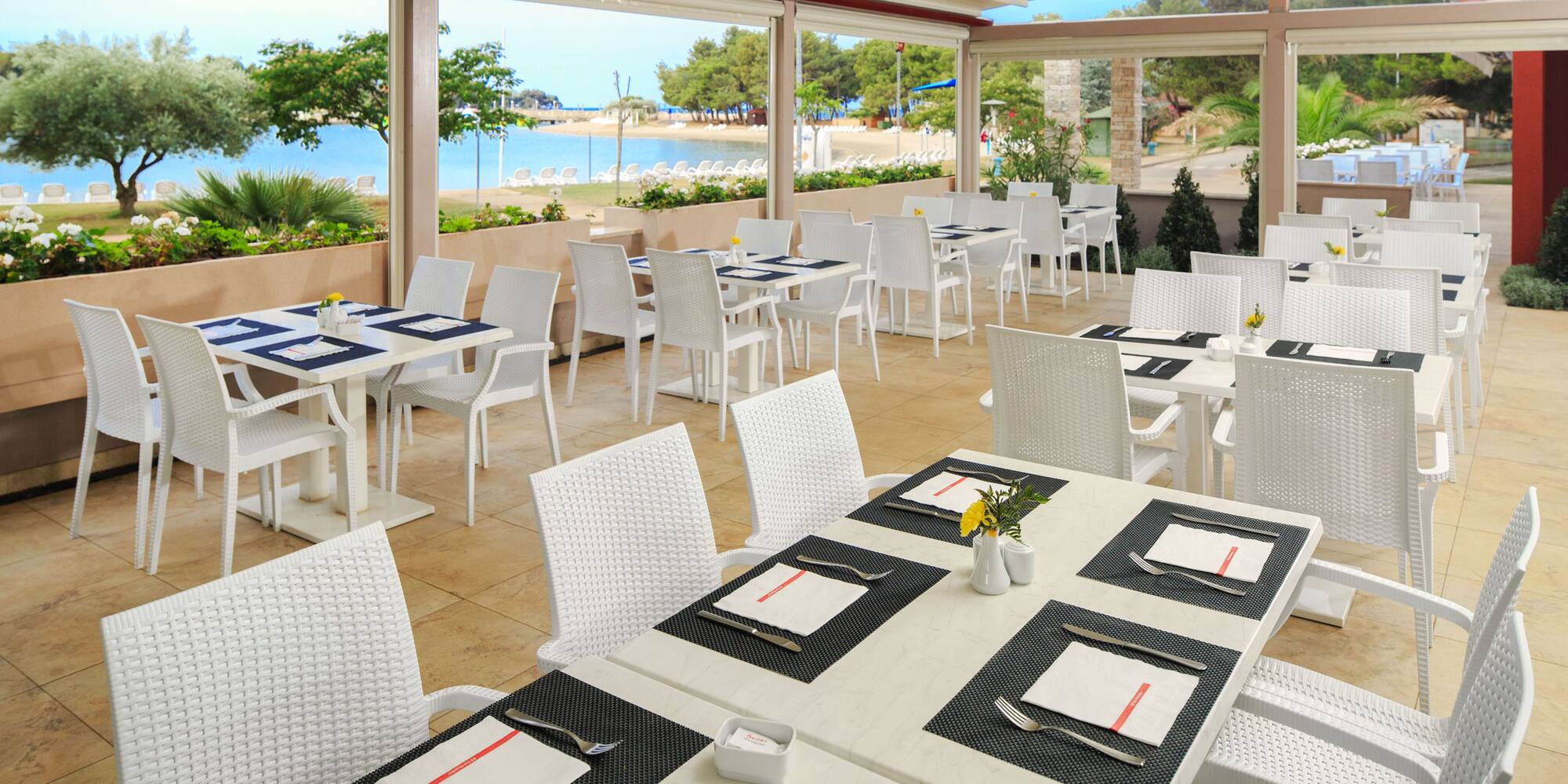 a restaurant with tables and chairs