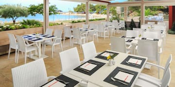 a restaurant with tables and chairs