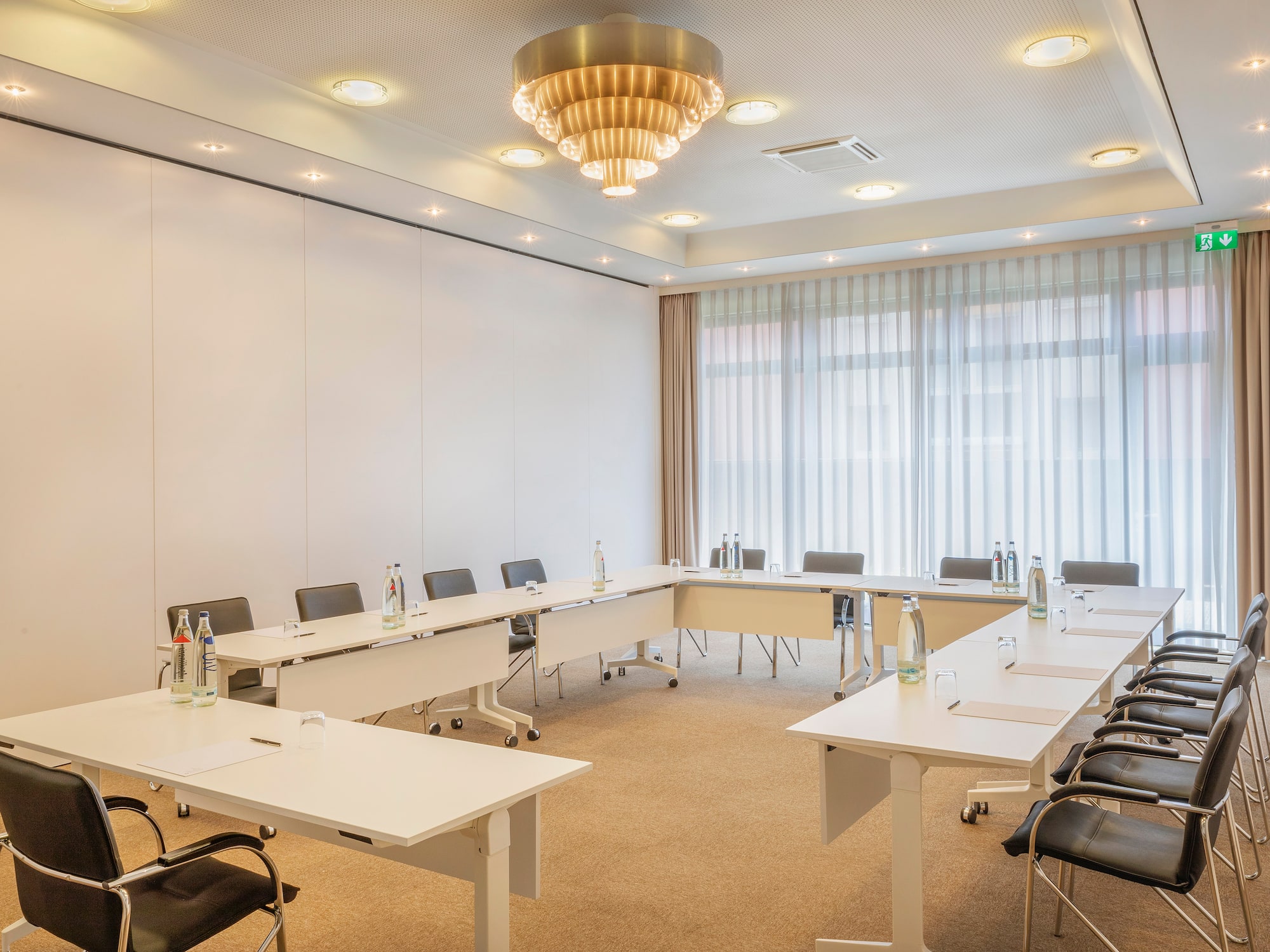 a room with tables and chairs