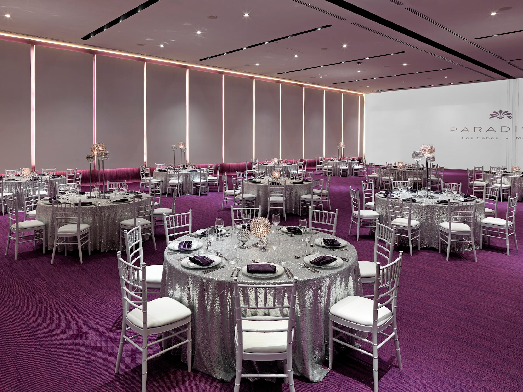 a room with tables and chairs