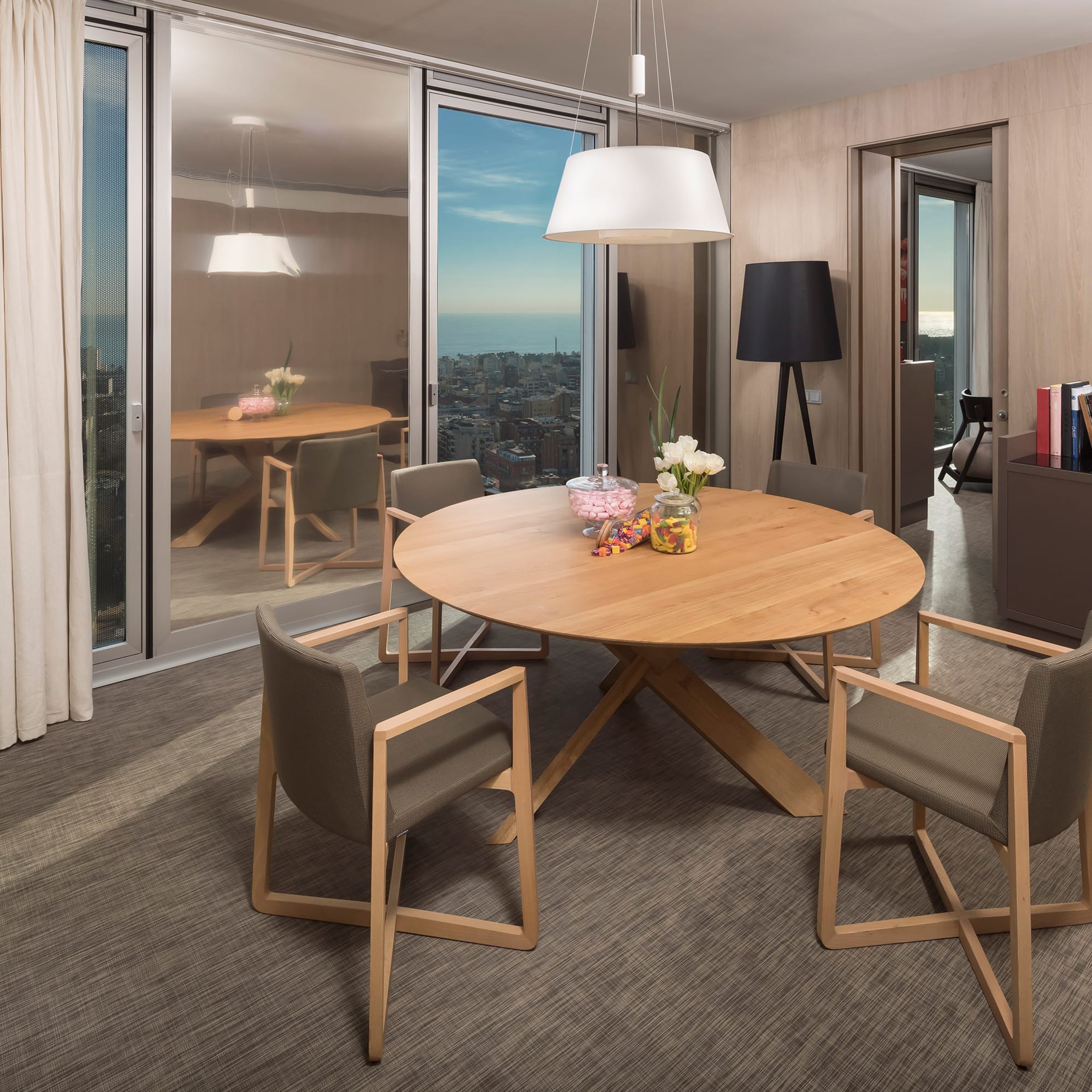 a room with a table and chairs