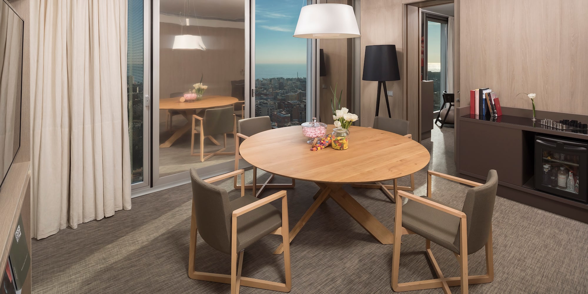 a room with a table and chairs