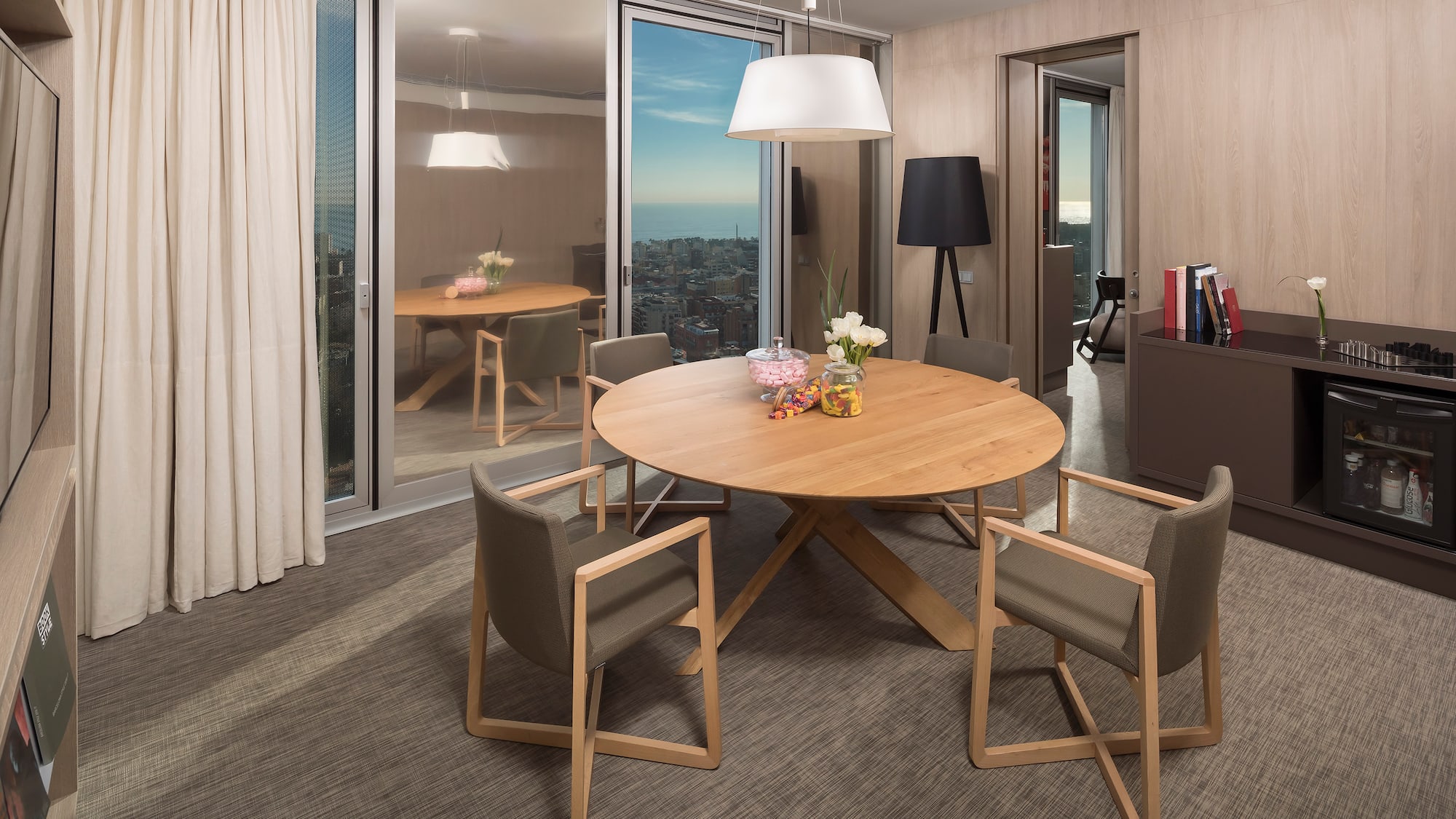 a room with a table and chairs