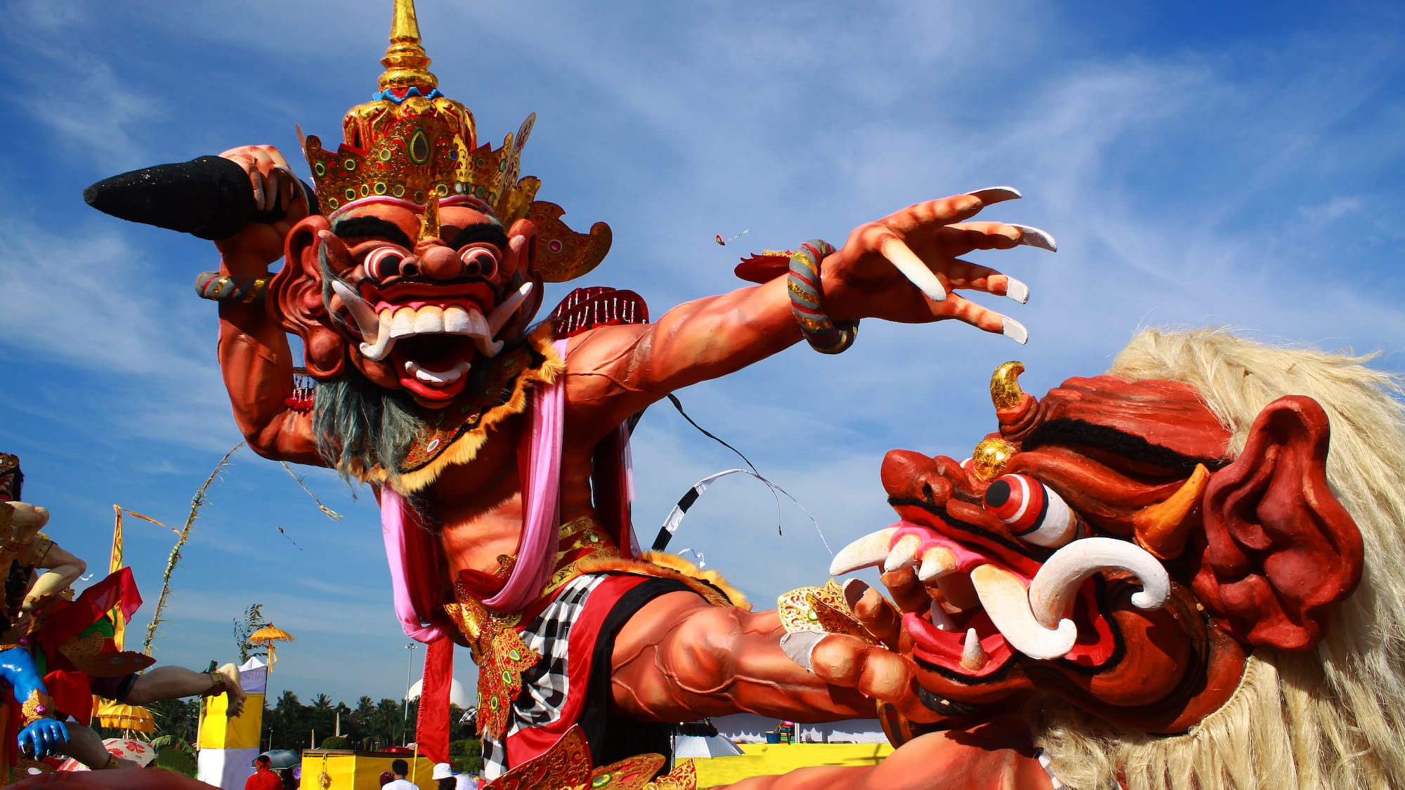 a statue of a man with a crown and a sword