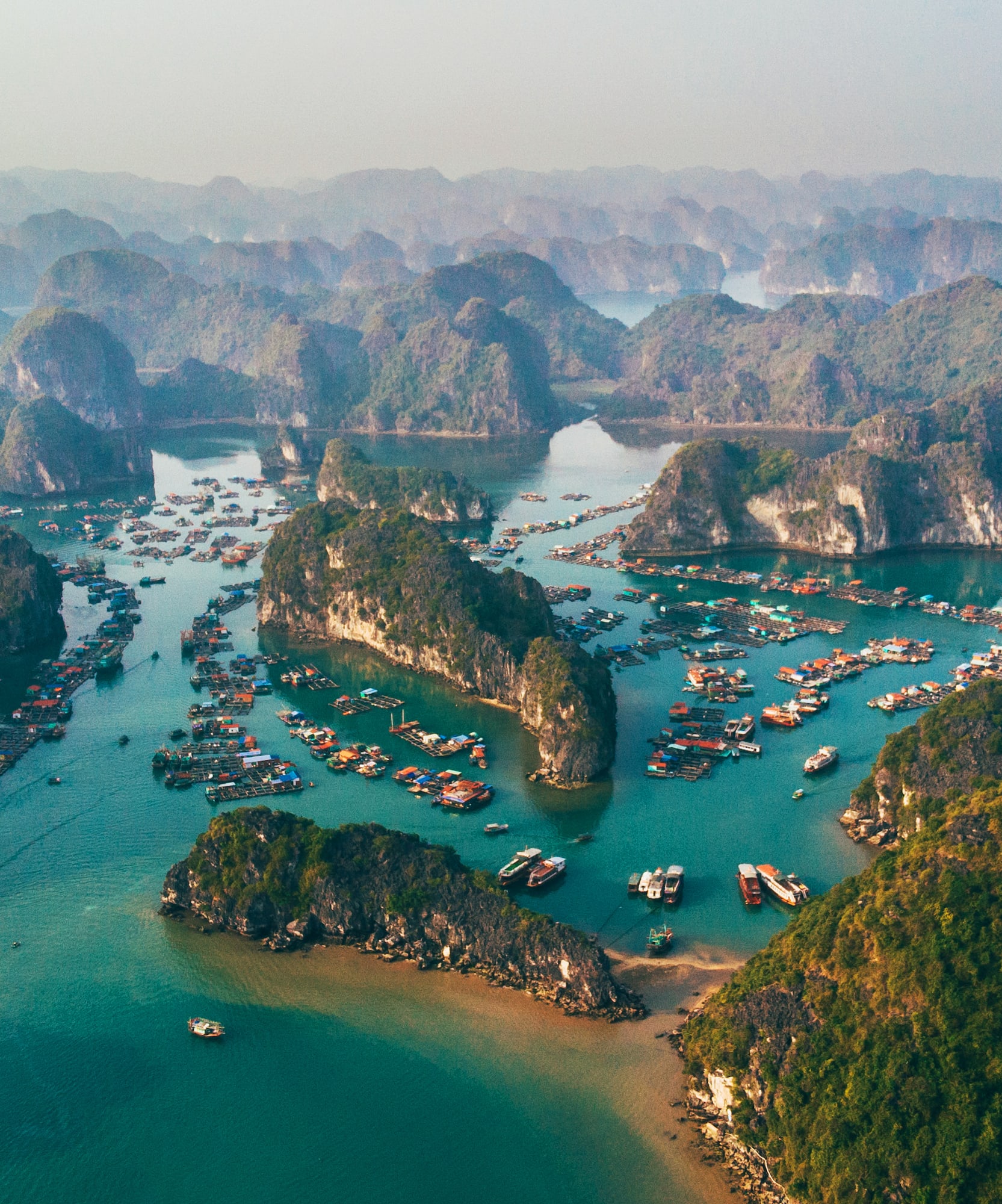 boats in the water with islands