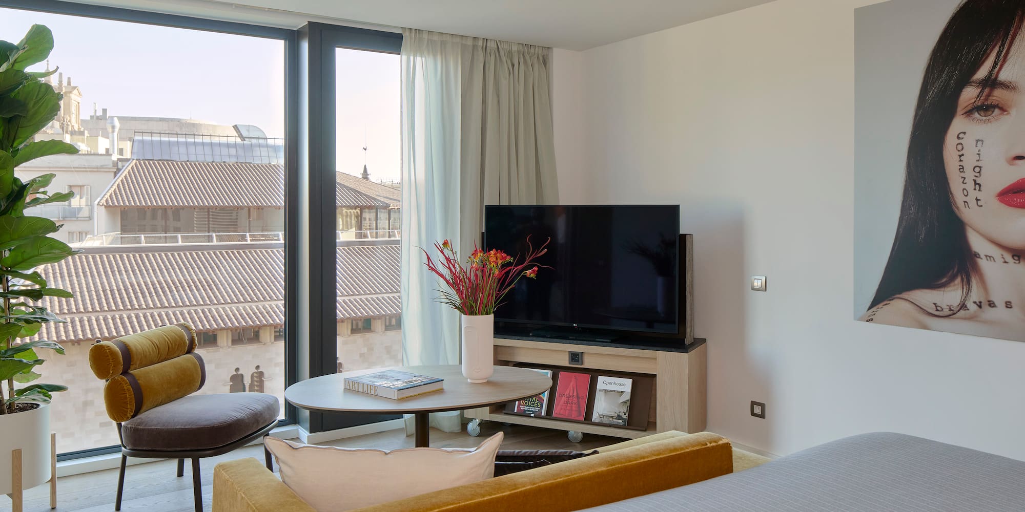 a room with a television and a chair