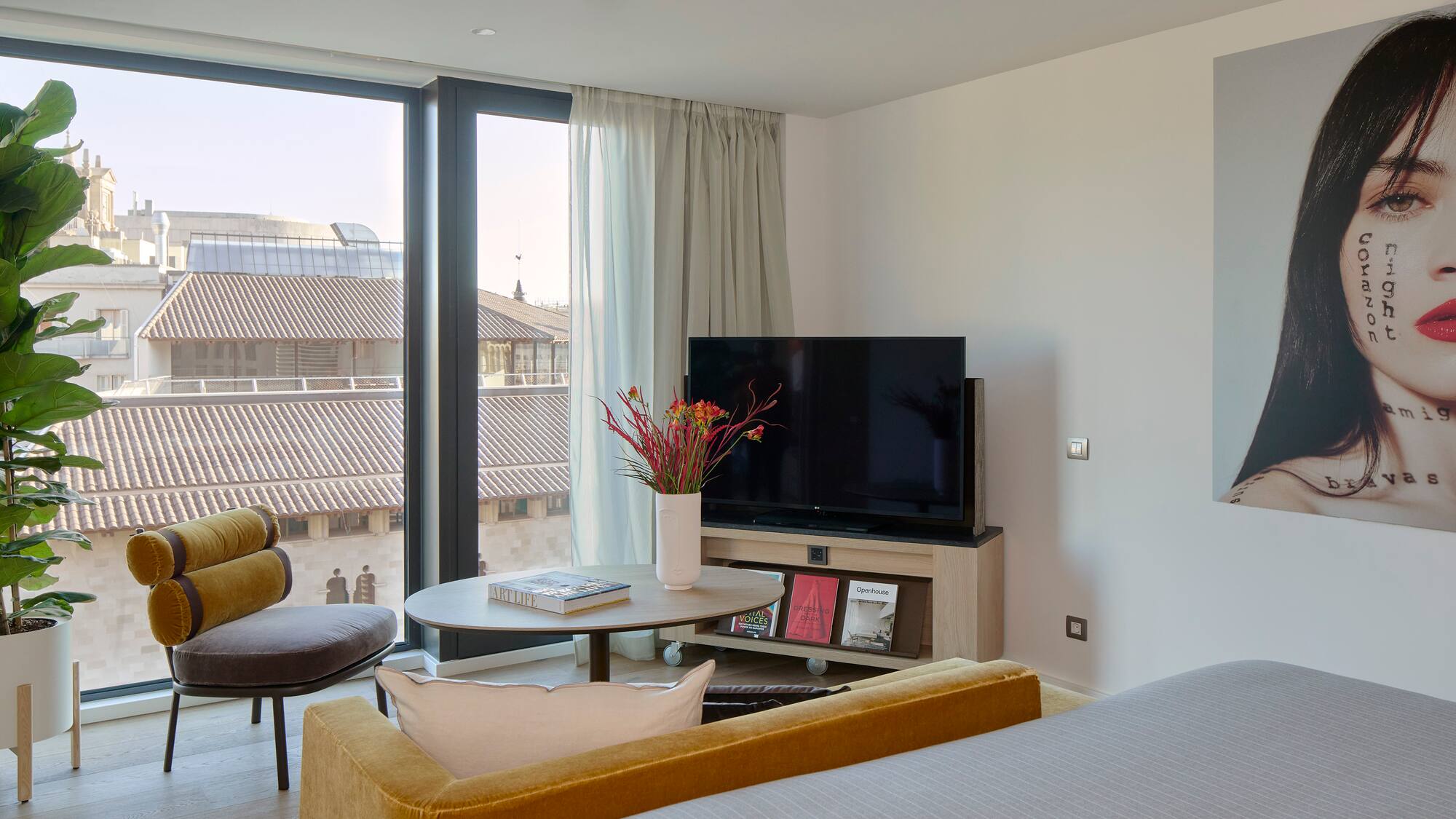 a room with a television and a chair